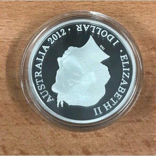 2012 $1 Year of the Dragon 1oz Silver Prooflike Coin in Capsule