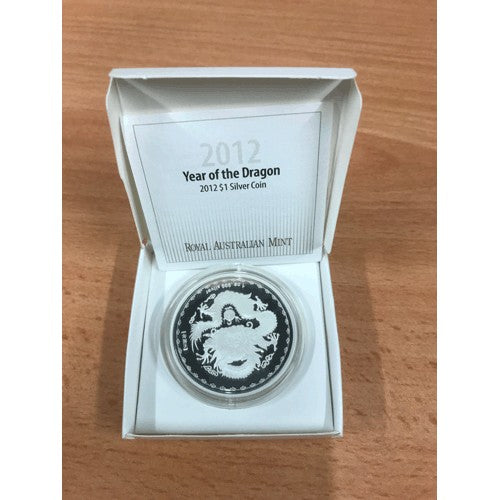 2012 $1 Year of the Dragon 1oz Silver Prooflike Coin in Capsule